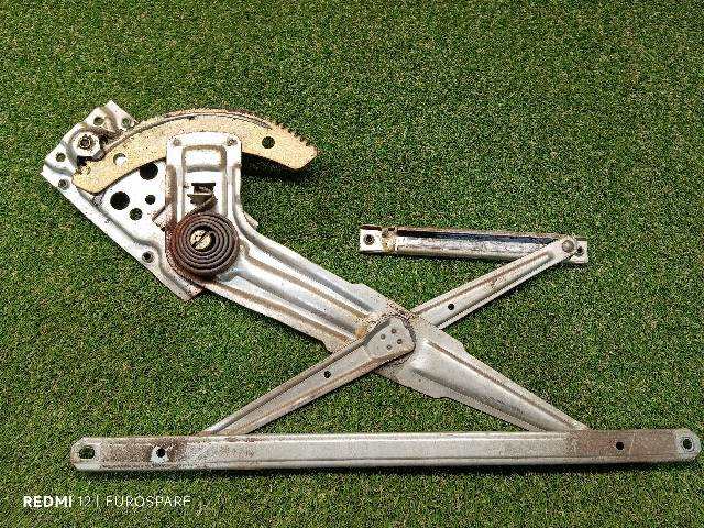 Foto 2ª: Elevalunas Manual Delantero Izquierdo Mitsubishi L200 2.5 D 4P CAJA ABIERTA [4D56] (1999)