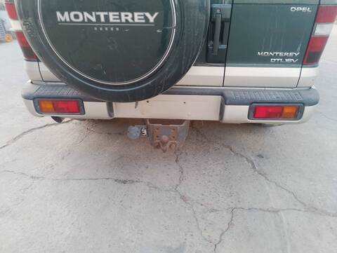 Foto 2ª: Paragolpes Trasero Opel Monterey BASICO 159CV 117KW [4JX1] (1998)