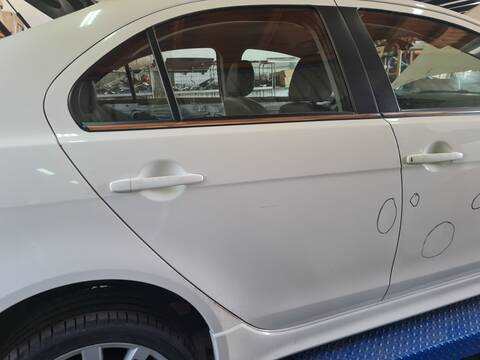 Puerta Trasera Derecha Mitsubishi Lancer INVITE 140CV 103KW